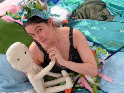 Nikky Smedley as The Tell Woman